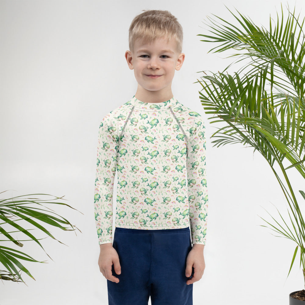 Rainbow Whales Kids Rash Guard - shown on a child